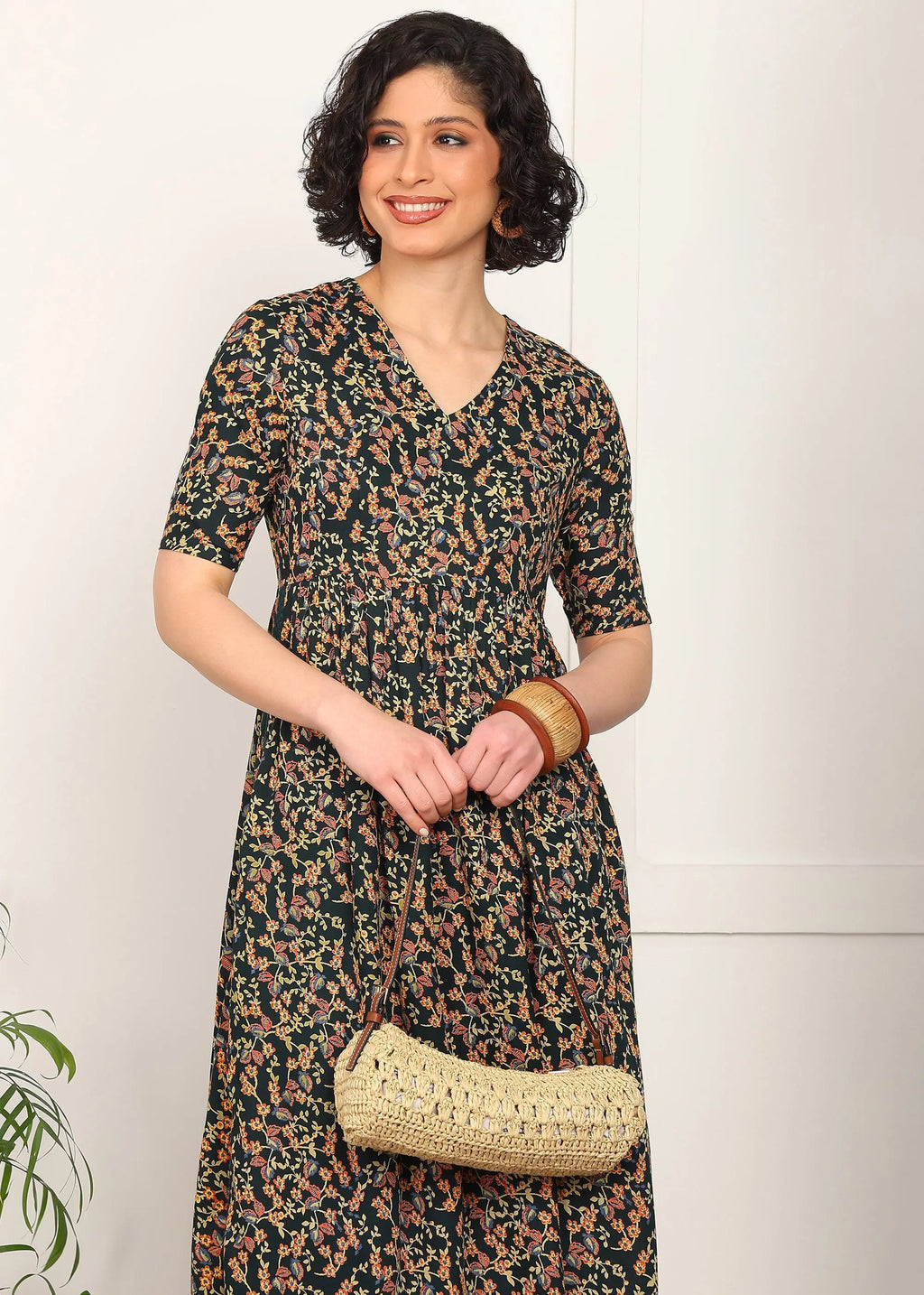 Women Black Floral Printed V-Neck Long Kurti MOMETOX