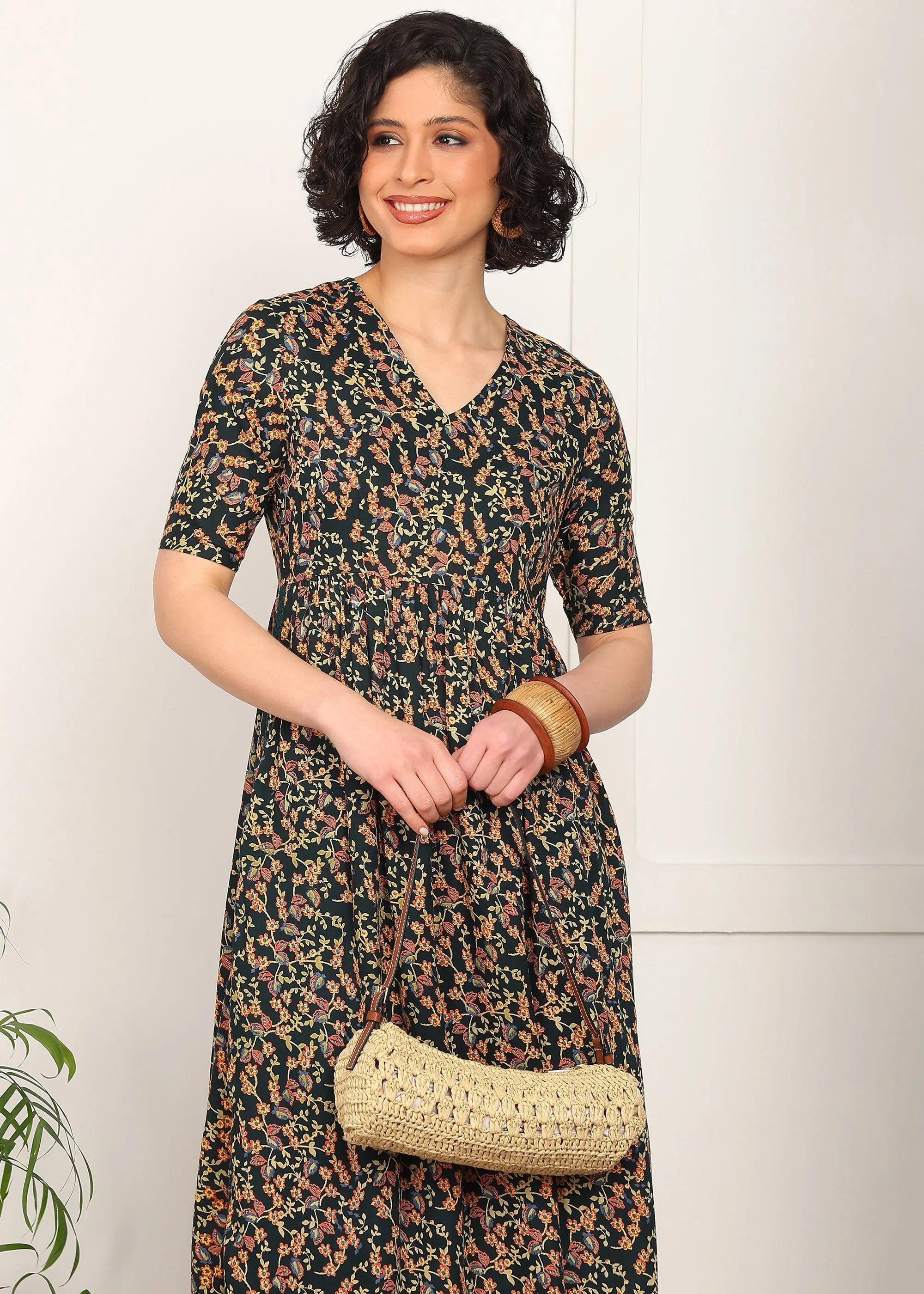 Women Black Floral Printed V-Neck Long Kurti MOMETOX